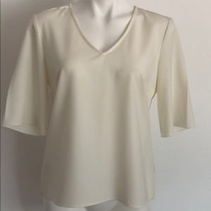 Short sleeved blouse. Size medium.